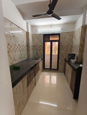 Kitchen in 1 BHK Apartment at Sai Gangat Apartment, Kasarvadavali – for Rent