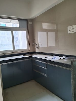 Kitchen in 1 BHK Apartment at Shree Ramdev Ritu Heights, Mira Road – for Rent