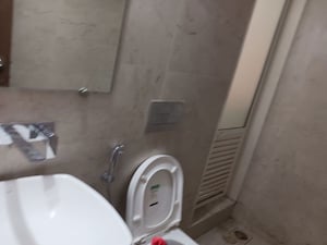 Bathroom in 1.5 BHK Apartment at Dosti West County, Balkum Pada – for Rent