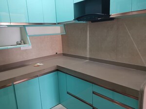 Kitchen in 1.5 BHK Apartment at Dosti West County, Balkum Pada – for Rent