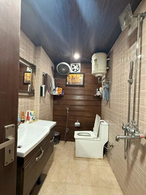 Bathroom in 2 BHK Apartment at Aman Luxury Apartments, Sahastradhara Road – for Rent