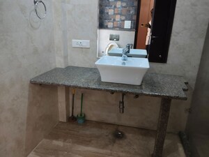 Master Bedroom in 1 BHK Independent House at Aman Luxury Apartments, Sahastradhara Road – for Sale