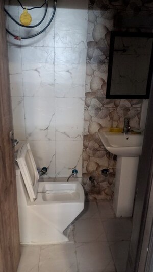 Bathroom in 2 BHK Apartment at Capital Royal Casa, Gms Road – for Rent