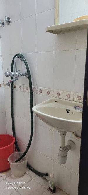 Bathroom in 1 BHK Apartment at Evershine Millennium Paradise, Kandivali East – for Sale