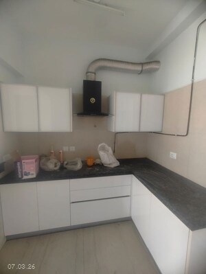 Kitchen in 3.5 BHK Apartment at Microtek Greenburg, Sector 86 – for Rent