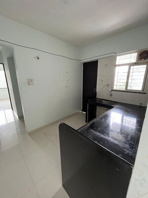 Kitchen in 1 BHK Apartment at Palladium Karan Heights, Wadgaon Sheri – for Sale