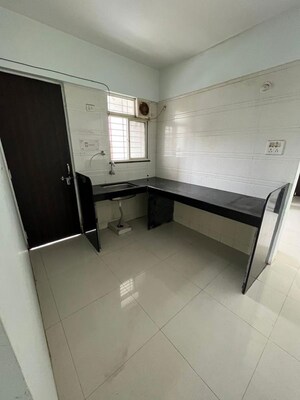 Kitchen in 1 BHK Apartment at Palladium Karan Heights, Wadgaon Sheri – for Sale