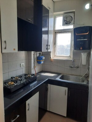Kitchen in 1 BHK Apartment at Aditya Celebrity Homes, Sector 76 – for Rent