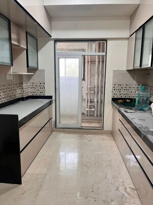 Kitchen in 3 BHK Apartment at Mahavir Square, Manpada – for Rent