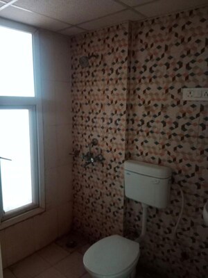 Bathroom in 2 BHK Apartment at SVP Gulmohur Garden, Raj Nagar Extension – for Rent