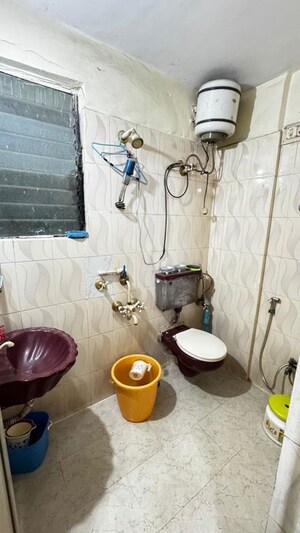 Bathroom in 2 BHK Apartment at Keshav Kunj Vashi, Vashi Sector 30a – for Rent