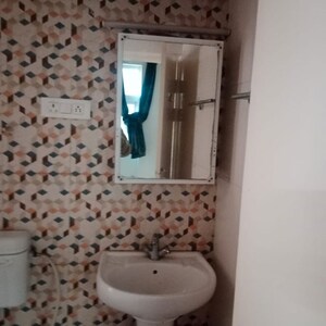 Bathroom in 2.5 BHK Apartment at Eureka Diya Green City, Sikrod – for Sale