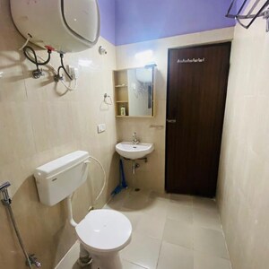 Bathroom in 2 BHK Apartment at Eureka Diya Green City, Sikrod – for Sale