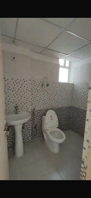 Bathroom in 2.5 BHK Apartment at Eureka Diya Green City, Raj Nagar Extension – for Sale