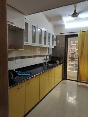 Kitchen in 2 BHK Apartment at Regency Estate, Dombivli East – for Sale