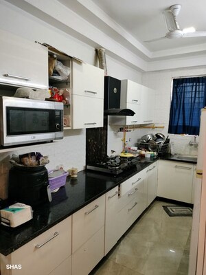Kitchen in 3 BHK Apartment at Parklands, Sector 85 – for Rent