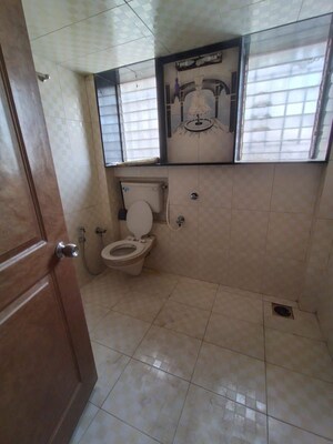Bathroom in 1.5 BHK Apartment at Manish Krishna CHS, Andheri West – for Rent