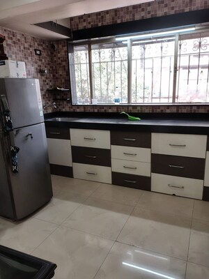 Kitchen in 1.5 BHK Apartment at Manish Krishna CHS, Andheri West – for Rent