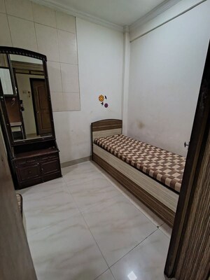 Bedroom in 1.5 BHK Apartment at Manish Krishna CHS, Andheri West – for Rent
