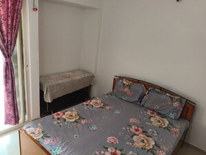 Bedroom in 2 BHK Apartment at Mantra Essence, Undri – for Rent