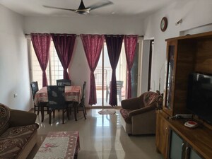 Living Room in 2 BHK Apartment at Mantra Essence, Undri – for Rent