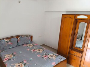 Bedroom in 2 BHK Apartment at Mantra Essence, Undri – for Rent