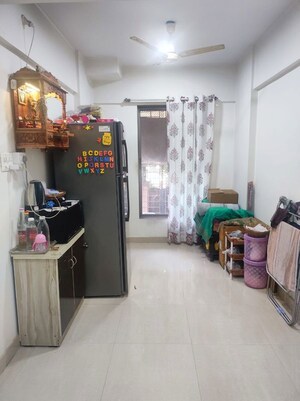 Living Room in 1 BHK Apartment at Prabhat Upvan CHS, Gawand Baug – for Sale