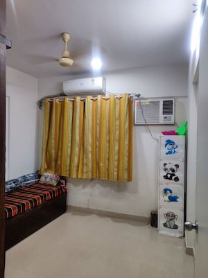Living Room in 1 BHK Apartment at Prabhat Upvan CHS, Gawand Baug – for Sale