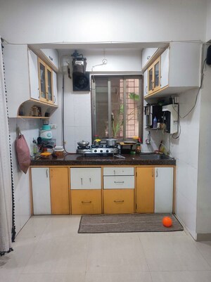 Kitchen in 1 BHK Apartment at Prabhat Upvan CHS, Gawand Baug – for Sale
