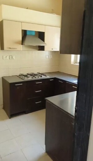 Kitchen in 3 BHK Apartment at Ansal API Esencia, Sector 67 – for Rent