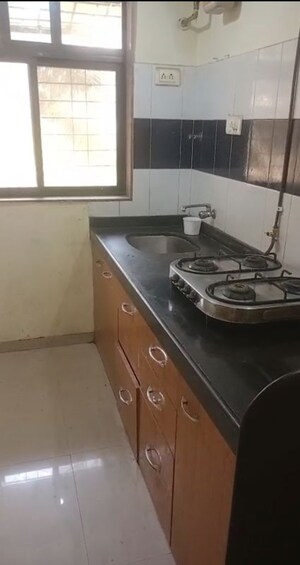 Kitchen in 2 BHK Apartment at Shakya Vihar CHS, Mulund East – for Rent