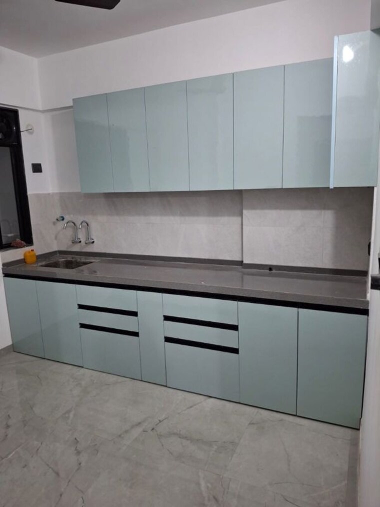 Kitchen, unique-youtopia 2 Bedroom 650 Sq.Ft. Apartment In Kharadi Pune 10208101