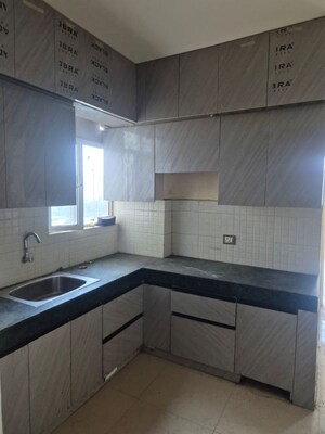 Kitchen in 2 BHK Apartment at ROF Aalayas, Sector 102 – for Rent