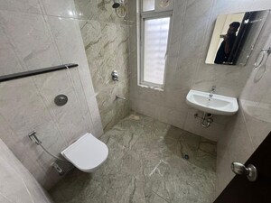 Bathroom in 3 BHK Apartment at Mantra Insignia, Mundhwa – for Rent