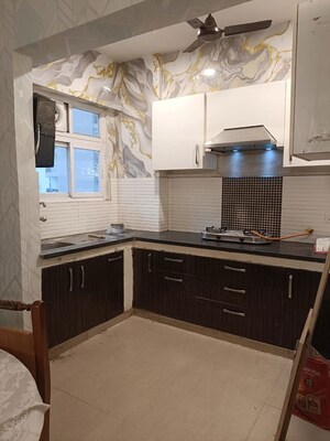 Kitchen in 3 BHK Apartment at Amrapali Zodiac, Sector 120 – for Rent