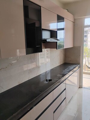 Kitchen in 3.5 BHK Apartment at Emaar Palm Gardens, Sector 83 – for Sale