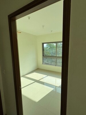 Room in 2 BHK Apartment at Kalpataru Immensa E, Kolshet Road – for Rent