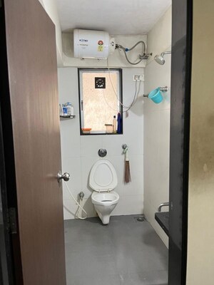 Bathroom in 2 BHK Apartment at Divya Smruthi, Malad West – for Rent