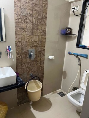 Bathroom in 2 BHK Apartment at Divya Smruthi, Malad West – for Rent