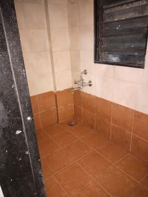 Bathroom in 1 BHK Apartment at Athene CHS, Majiwada – for Rent