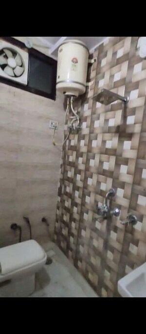 Bathroom in 3 BHK Builder Floor at Dwarka Mor – for Sale