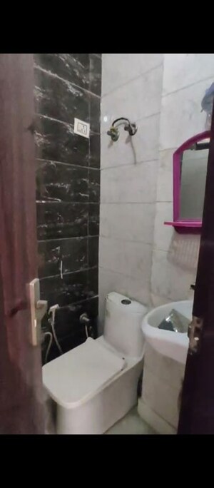Bathroom in 3 BHK Builder Floor at Dwarka Mor – for Sale