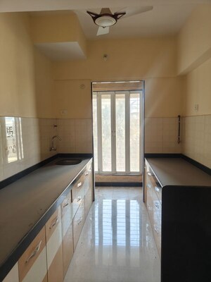 Kitchen in 2 BHK Apartment at Hubtown Greenwoods F Wing, Vartak Nagar – for Rent