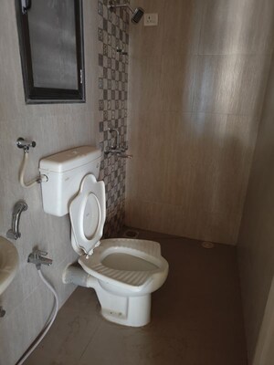 Bathroom in 2 BHK Apartment at Hubtown Greenwoods F Wing, Vartak Nagar – for Rent