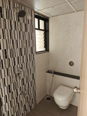 Bathroom in 2 BHK Apartment at Kohinoor Courtyard One, Wakad – for Rent