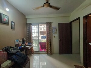 Living Room in 2 BHK Apartment at Runwal Eirene, Balkum Pada – for Sale