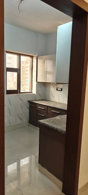 Kitchen in 4 BHK Apartment at Dew Drops Society, Sector 2 – for Sale