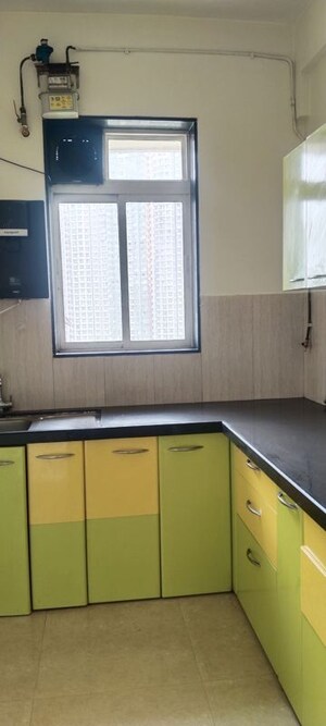 Kitchen in 2 BHK Apartment at Runwal Greens, Mulund West – for Rent