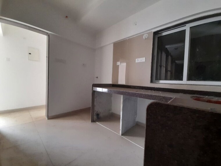 Kitchen, avant-hillway 2 Bedroom 756 Sq.Ft. Apartment In Goregaon East Mumbai 10208492