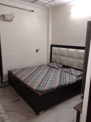 Bedroom in 2 BHK Builder Floor at Nirman Vihar – for Rent
